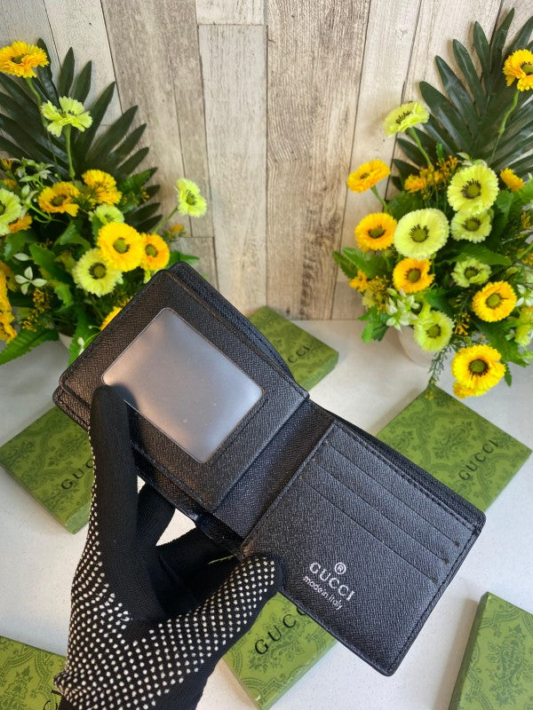 Gucci Embossed Logo Black Flap Wallet