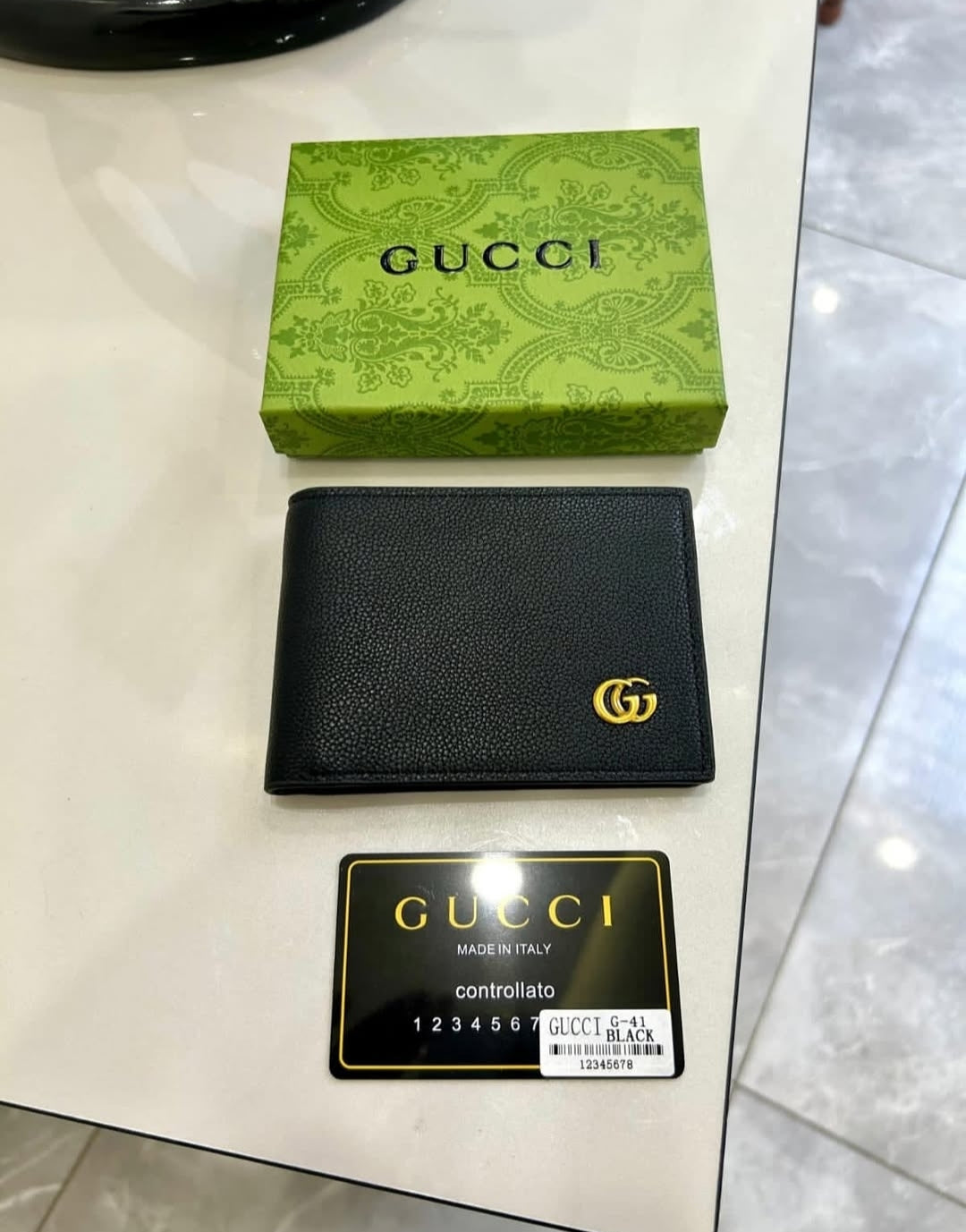 Gucci Black GG Plain Wallet