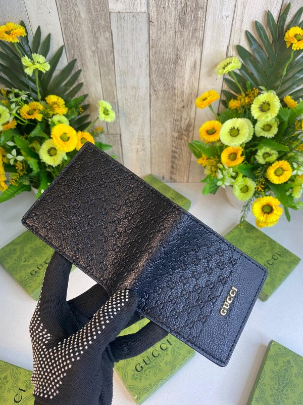 Gucci Embossed Logo Black Flap Wallet