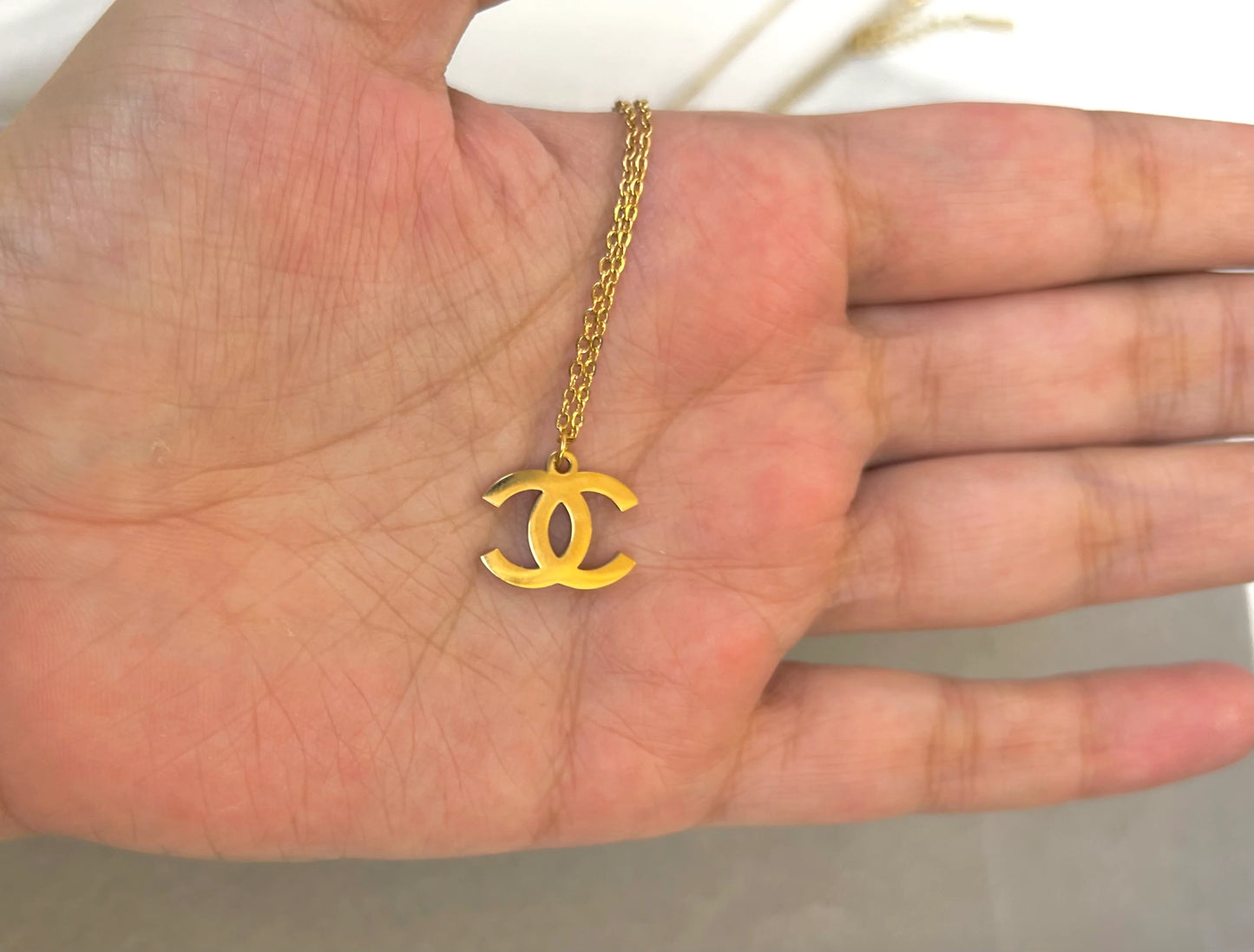 Chanel Logo Golden Necklace - T Store.pk